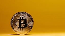 Bitcoin on Yellow Background